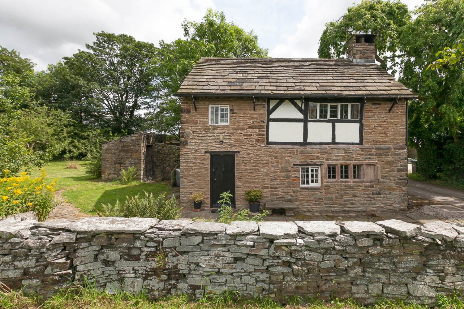Grade II listed cottage with half acre orchard